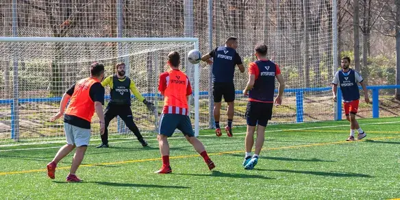 Photograph of soccer players in the goal in an IF7Sports match