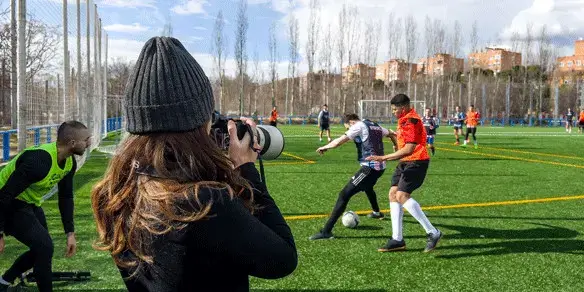 Photographe prenant des photos d'un match IF7SPORTS