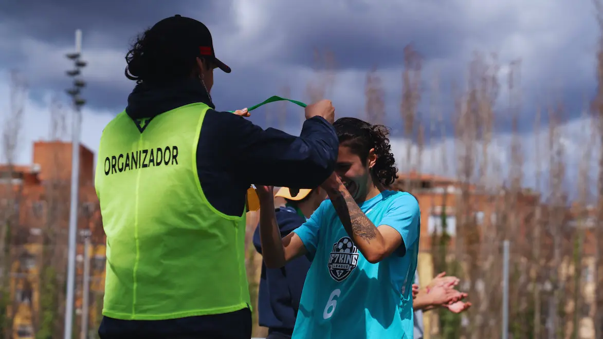 Two IF7SPORTS organizers watching a match
